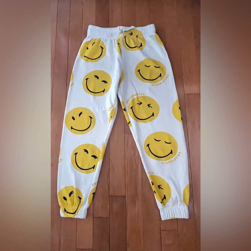Yellow n cream color sweatpants with smiley faces
